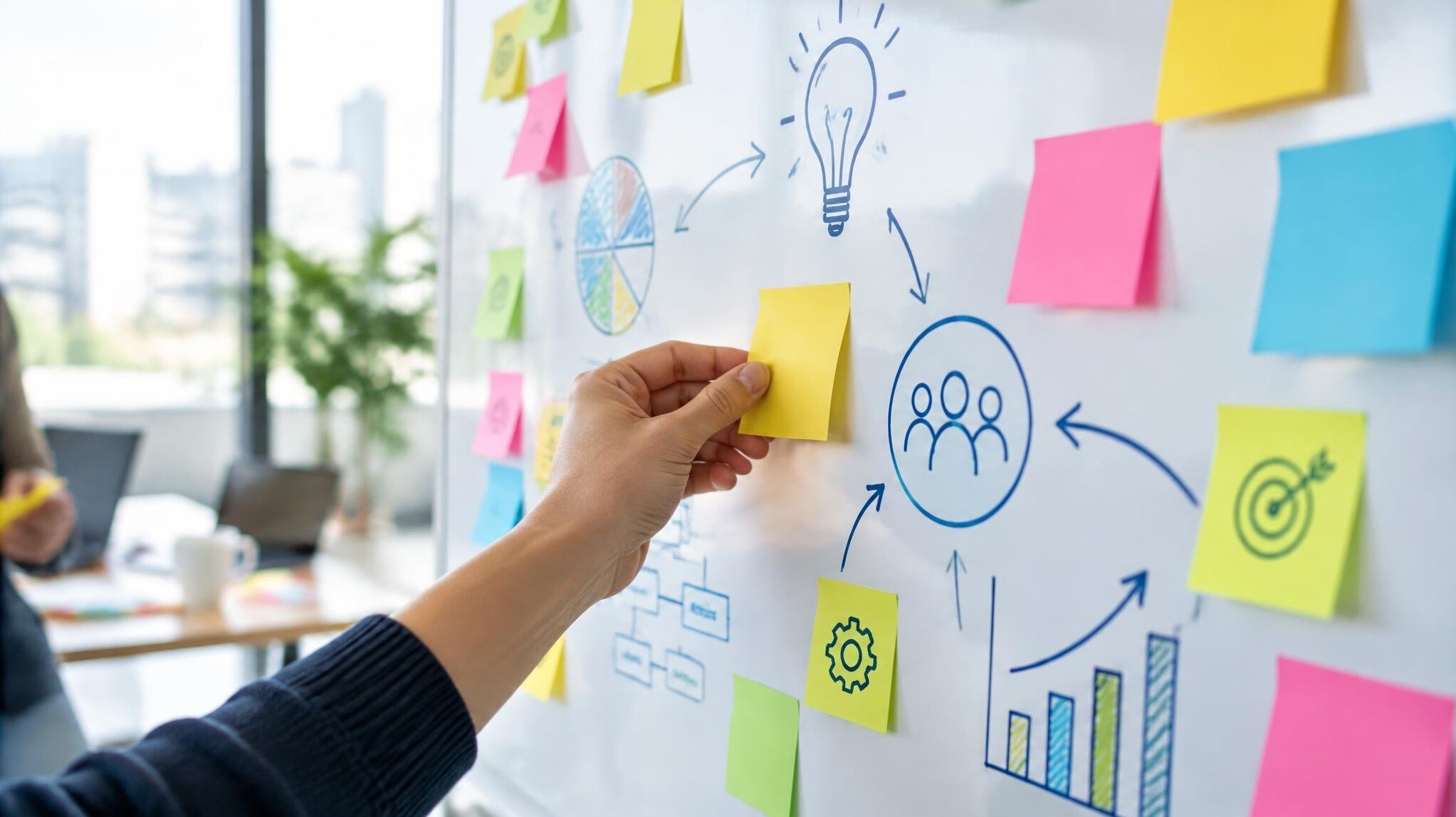 Whiteboard with sticky notes during a planning session