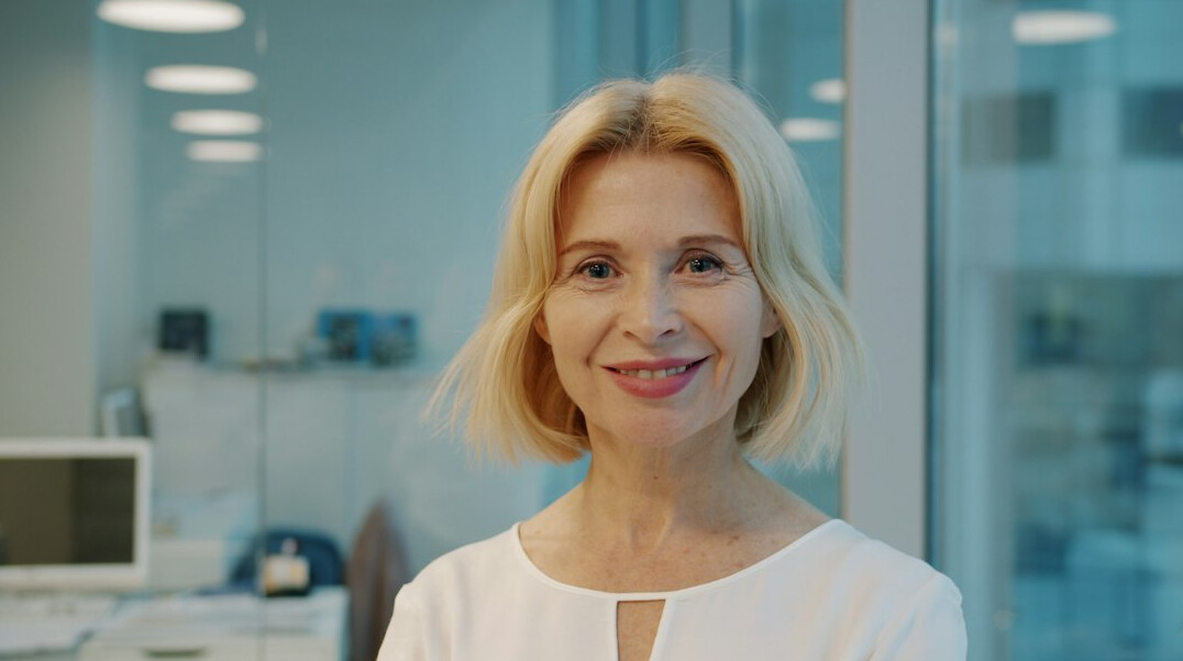confident businesswoman leading